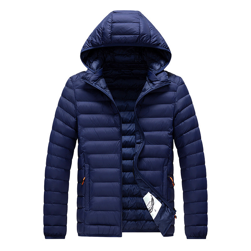 Men's navy blue quilted puffer jacket with hood, lightweight slim-fit.