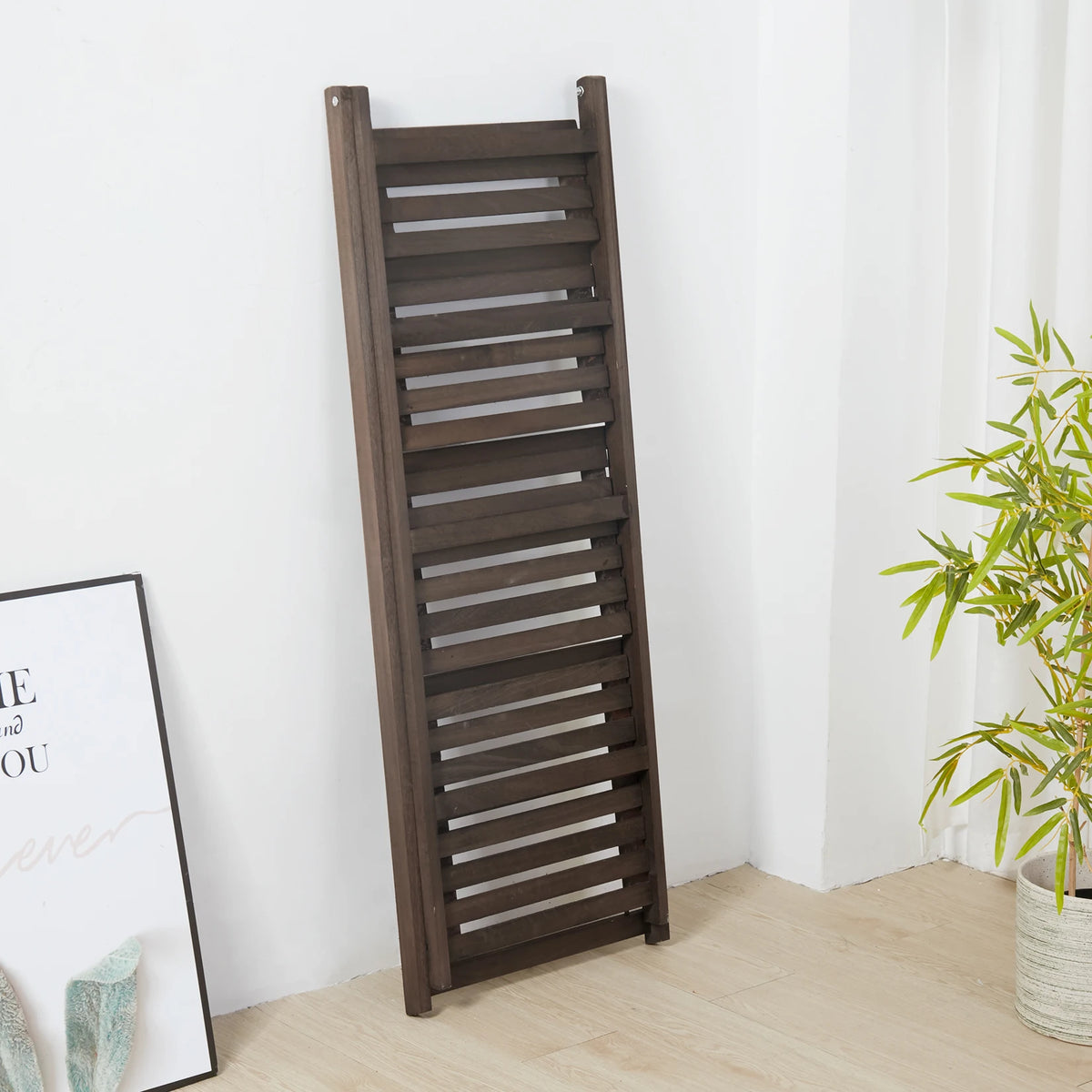 Folding 4-tier wooden ladder shelf by S And B Enterprise; dark brown indoor storage and plant display rack