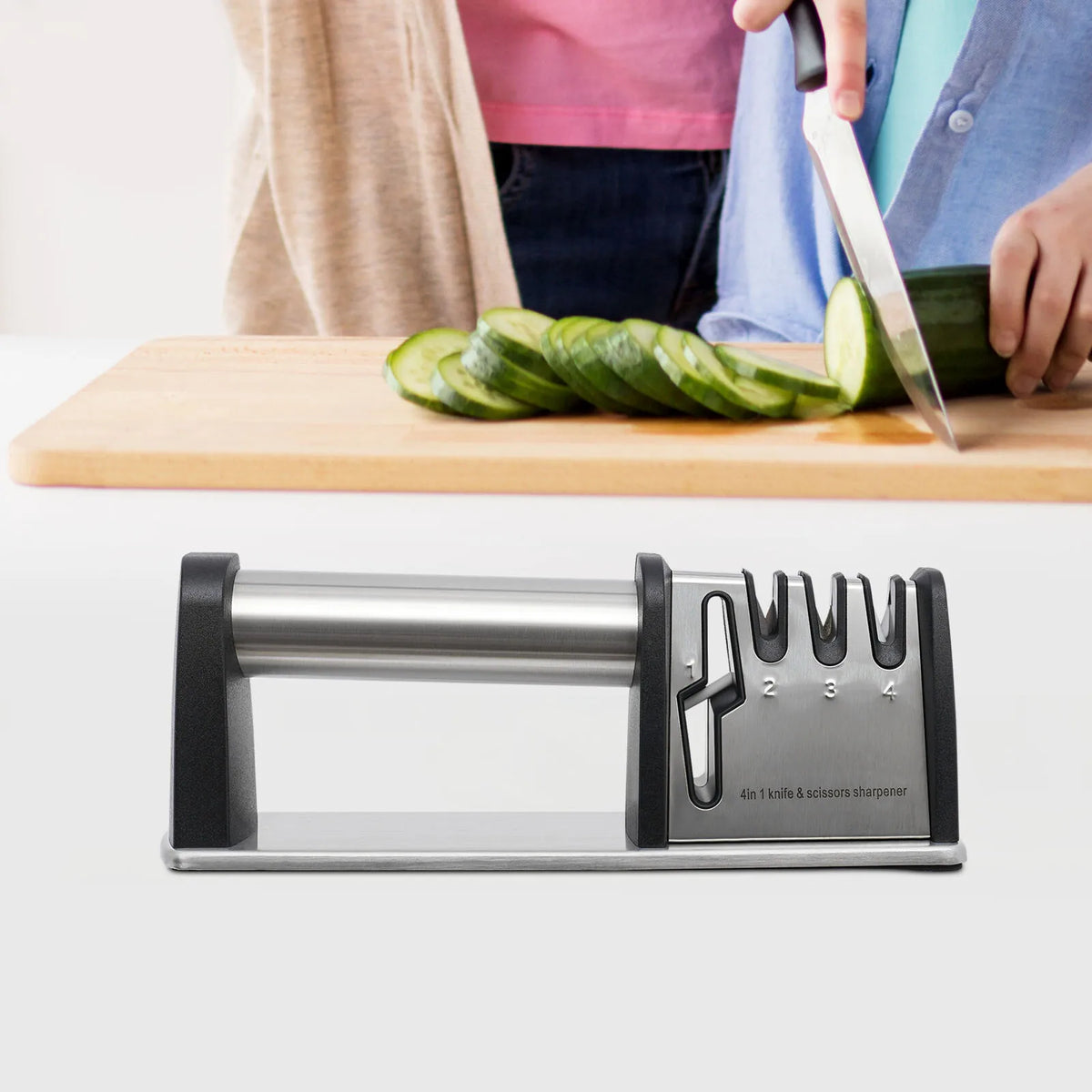 4-stage knife sharpener with ceramic and tungsten sharpening slots on stainless steel housing