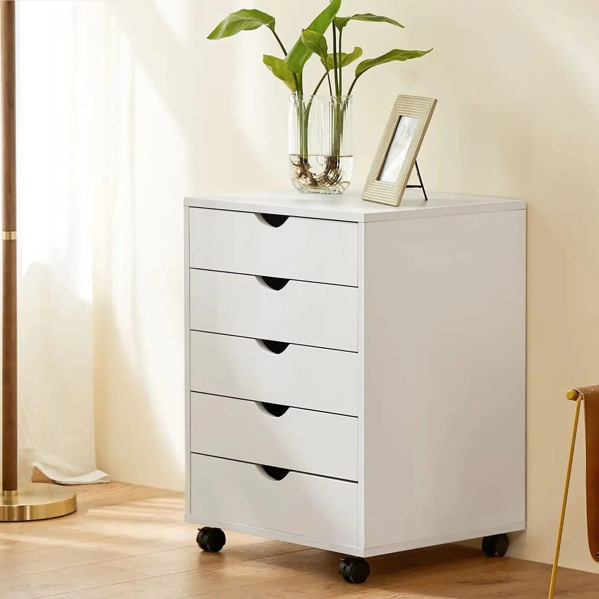S And B Enterprise wood nightstand with five drawers on casters, light gray finish.