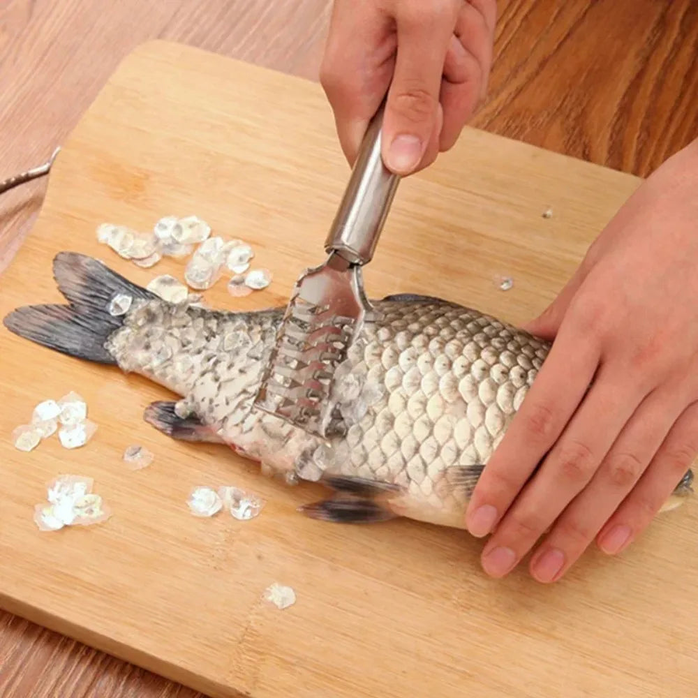 Multi-Purpose Kitchen Scraper, fish scaler with stainless steel handle, 23cm on cutting board