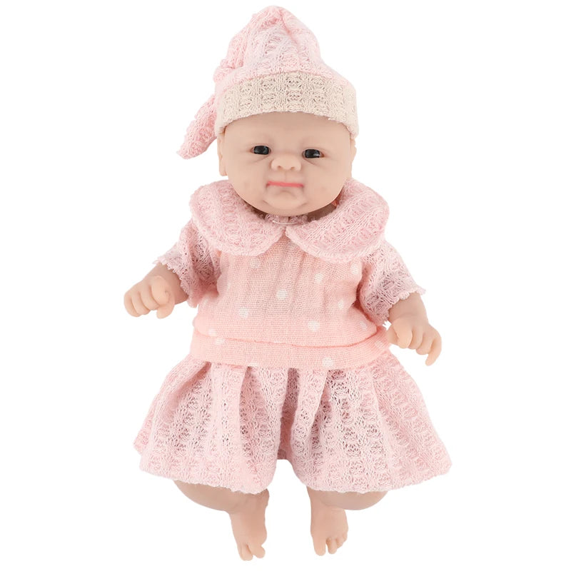 IVITA silicone reborn doll in pink knit dress and hat, lifelike newborn baby girl toy