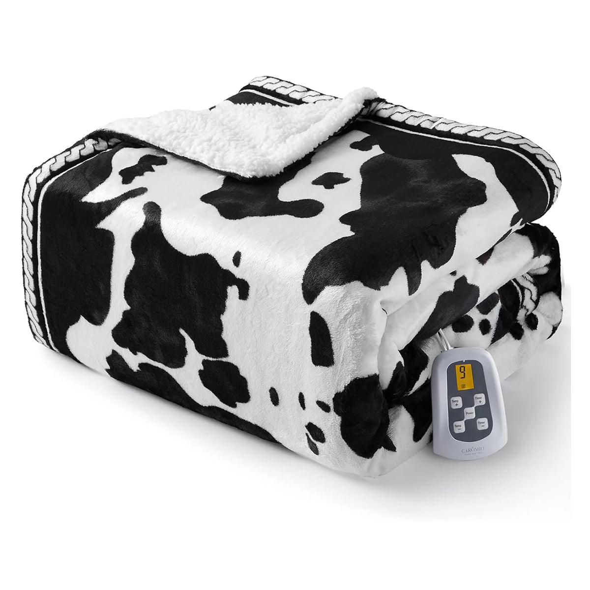Heated electric blanket by S And B Enterprise, cow-print fleece with LCD controller, machine washable.