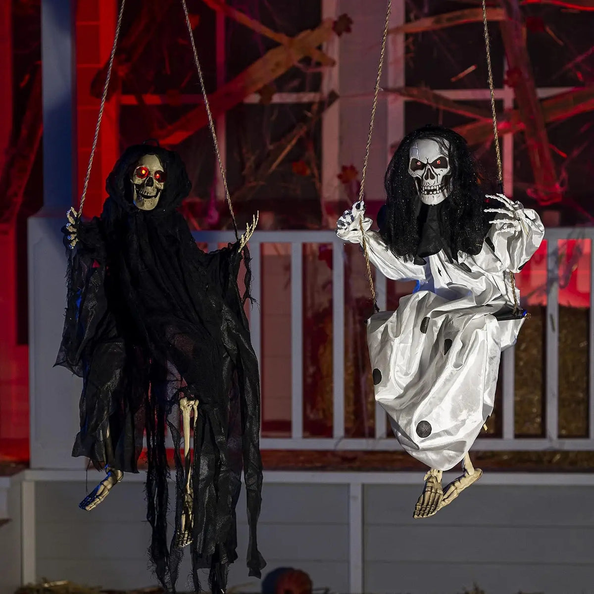 59-inch animated hanging Grim Reapers; pair in black and white cloaks with glowing red eyes, by S And B Enterprise