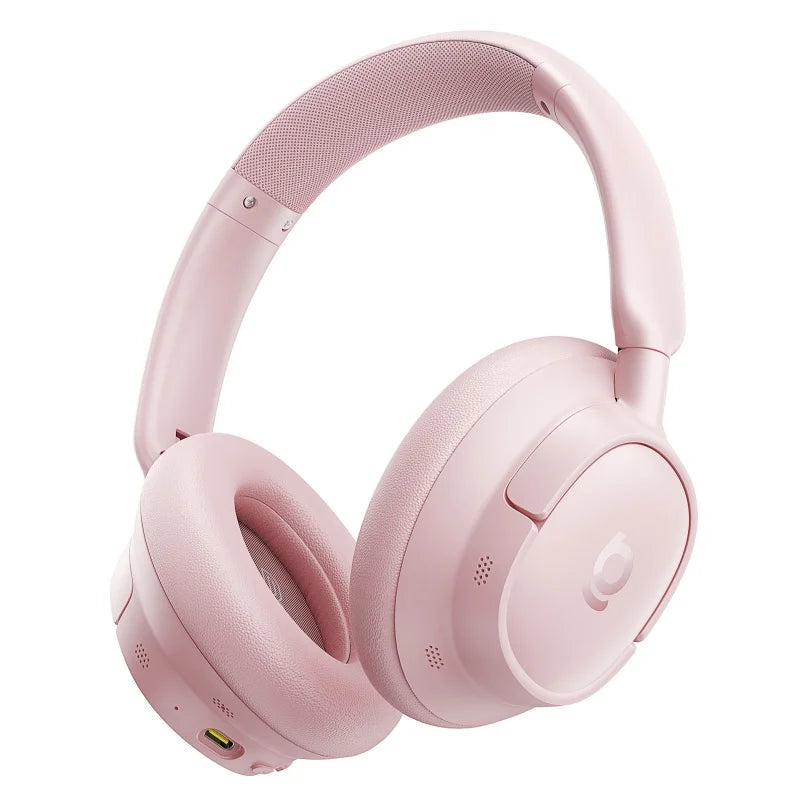 Beats pink over-ear headphones with cushioned ear pads and adjustable headband.