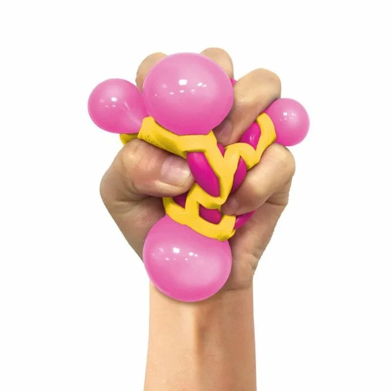 Schylling Needoh Atomic stress relief ball squishy toy held in hand; pink bubble spheres with yellow lattice frame.