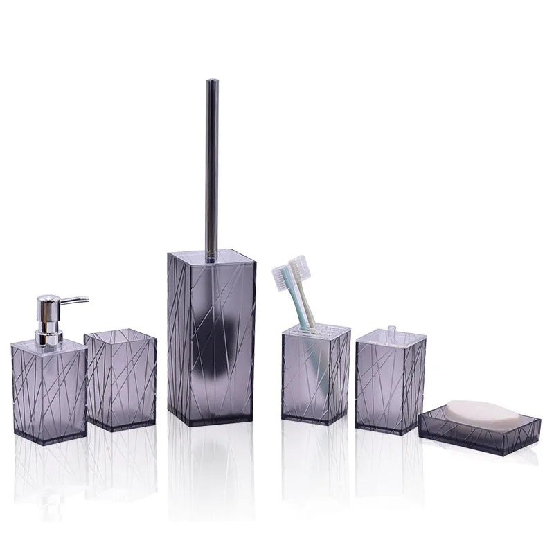 6-piece bathroom set in smoky purple acrylic: dispenser, toothbrush holder, cup, soap dish, toilet brush, trash can.