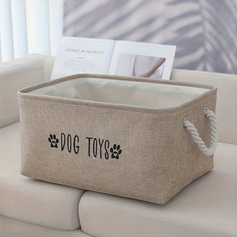 Pet toy storage basket, beige woven polyester with rope handles, DOG TOYS printed on side