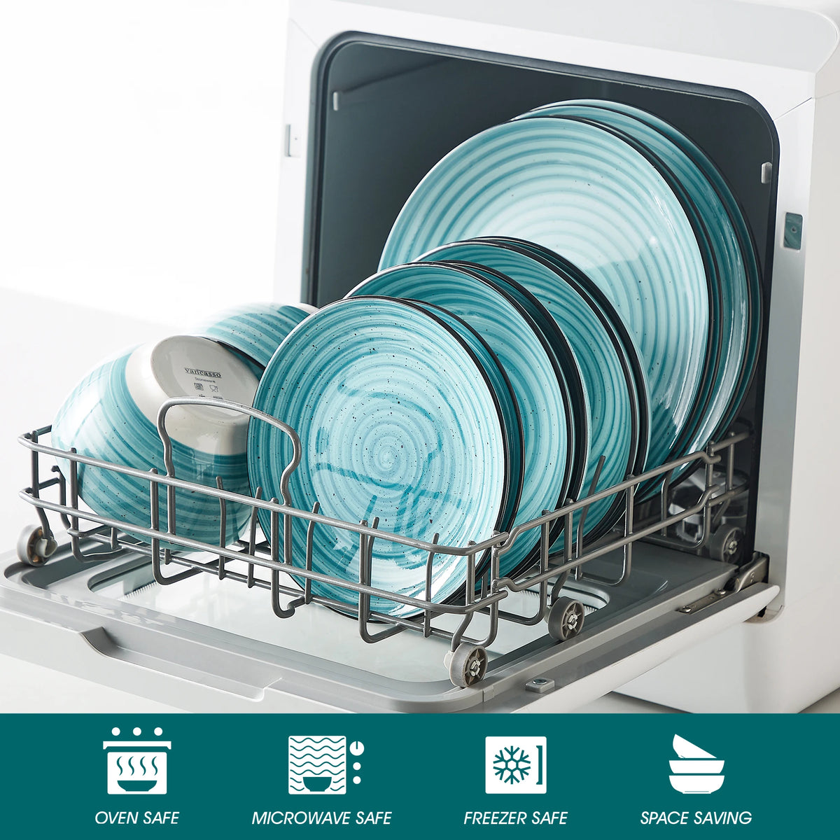 Vancasso blue swirl dinner plates stacked in a dishwasher rack; brand visible