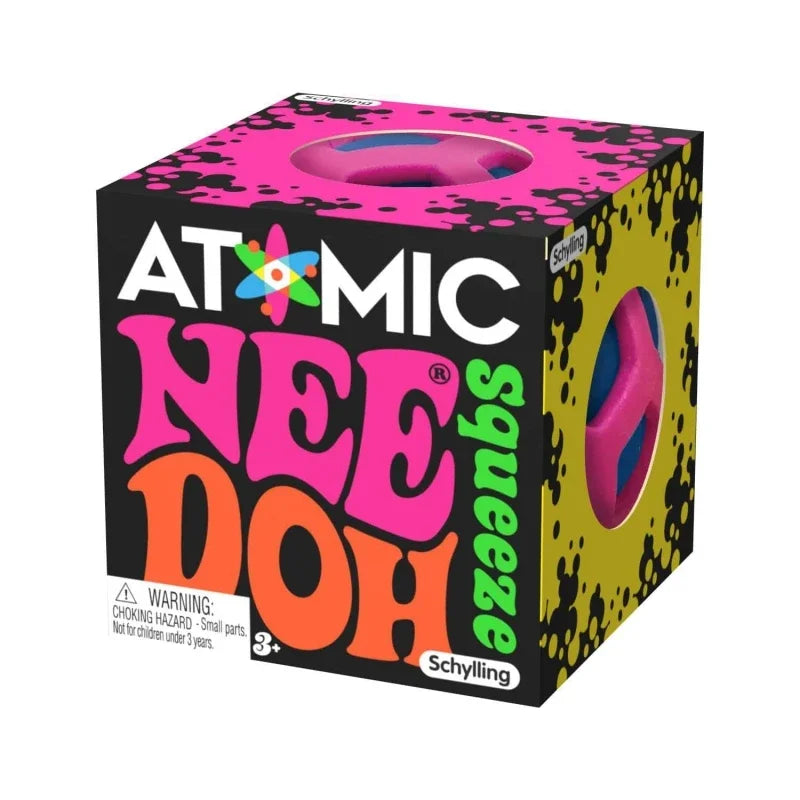 Atomic Needoh stress-relief squishy box by Schylling; pink packaging, black splatters, yellow side, window shows toy.