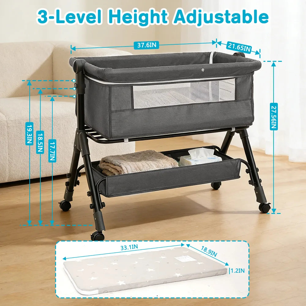 3-in-1 baby bassinet by S And B Enterprise with 3-height levels, gray bedside sleeper on a wheeled stand.