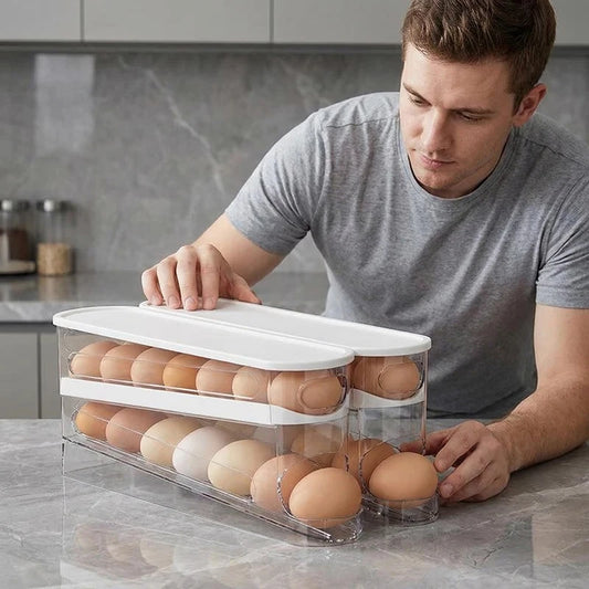 Two-tier clear plastic egg storage box with white lid, ladder-style fridge egg dispenser.