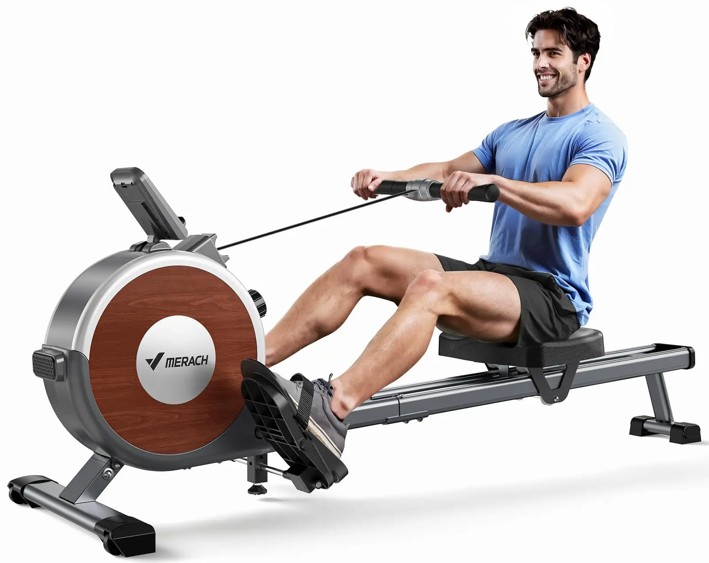 Merach magnetic rowing machine with wood-style flywheel; user rowing on dual slide rails.