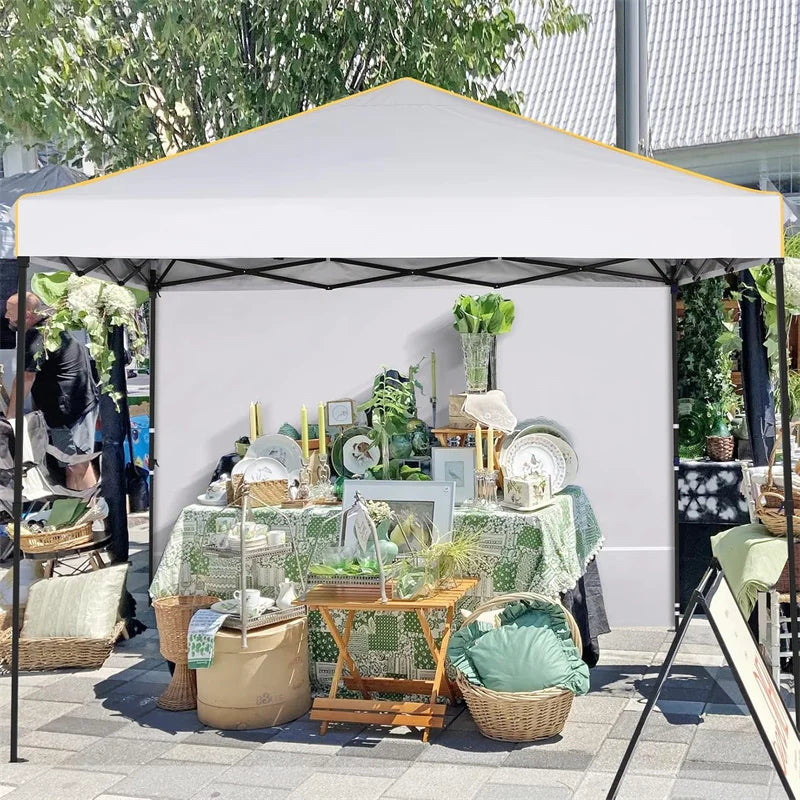 10x10 ft pop up canopy tent with white sidewalls and yellow trim for outdoor market display