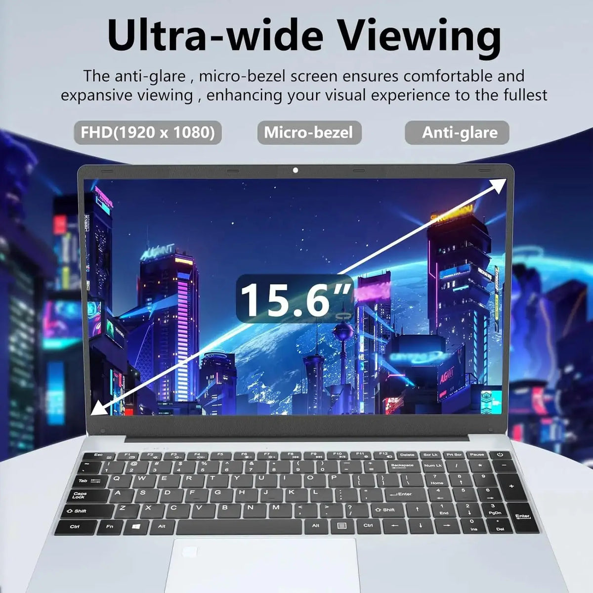 15.6-inch Windows laptop with silver body and cityscape wallpaper