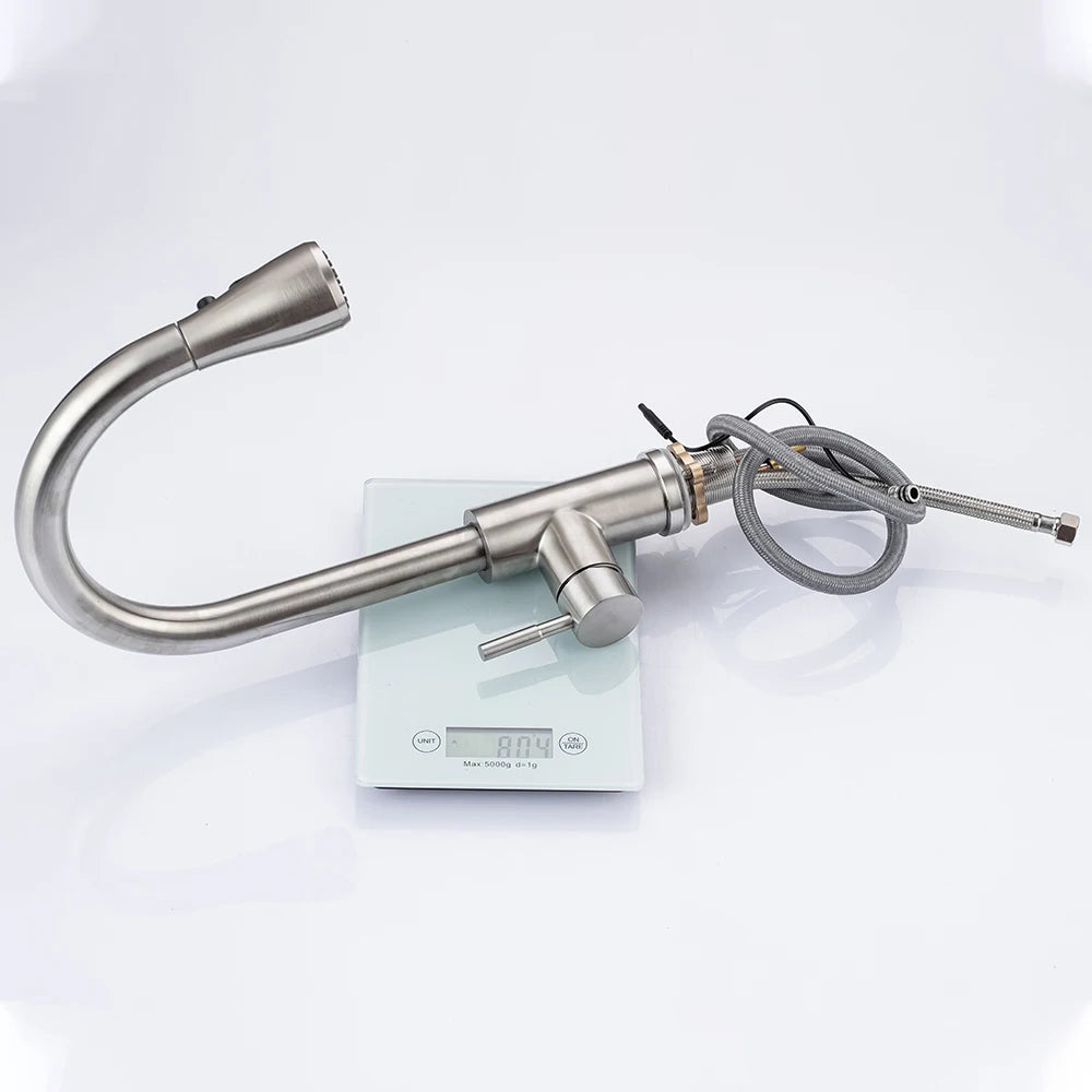 Brushed nickel touchless kitchen faucet by S And B Enterprise with infrared sensor and pull-down spray head