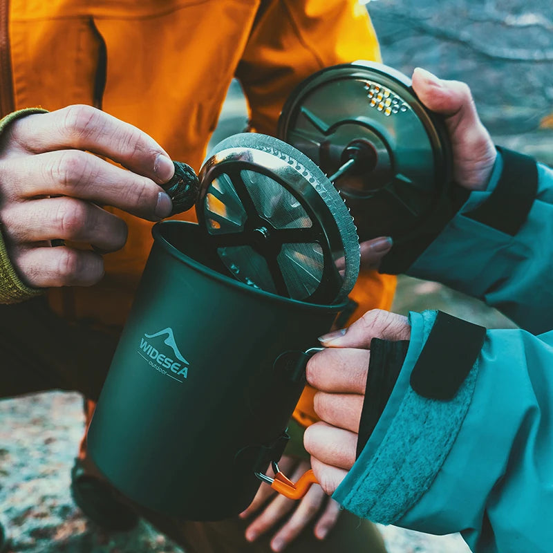 Widesea camping coffee pot with built-in French press mug in dark green.