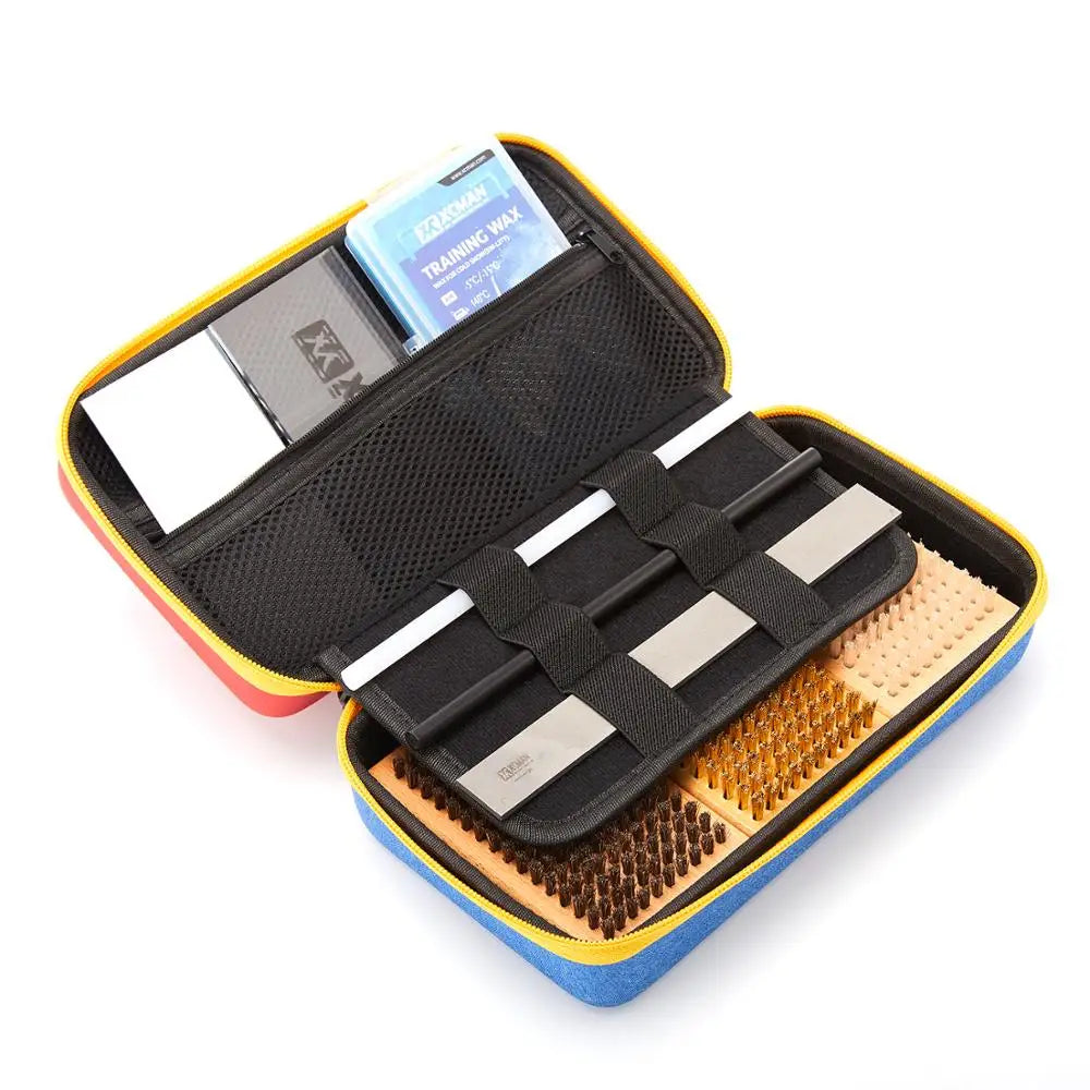 XCMAN Ski Snowboard Waxing & Tuning Brush Kit in a yellow-blue case; nylon, brass, and horsehair brushes with metal scraper