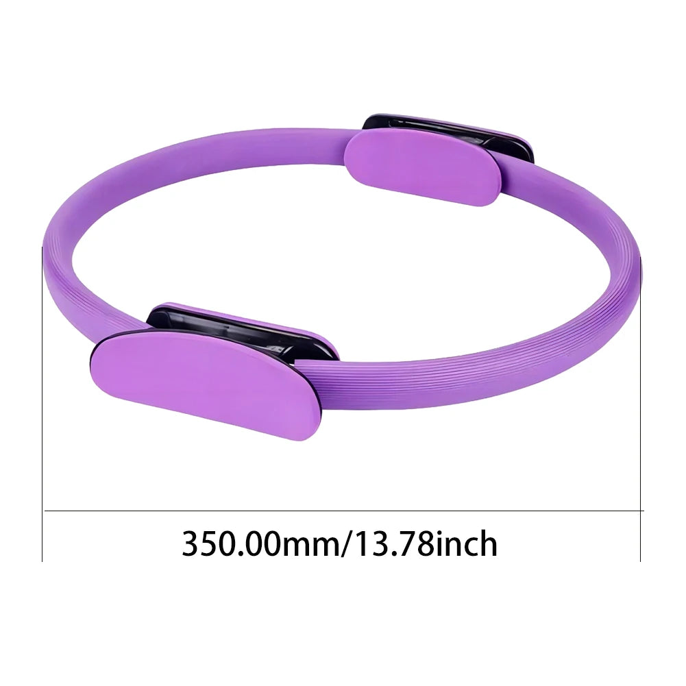 Pilates ring with non-slip handles in purple for core workouts, fitness accessory.