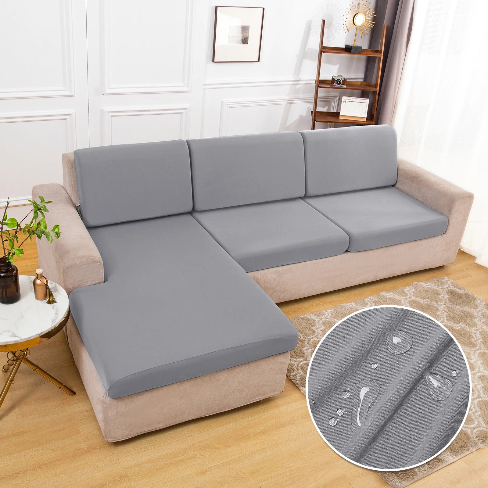 Waterproof grey sofa cushion covers on a beige sofa; 3 cushions visible with a close-up showing water droplets on fabric