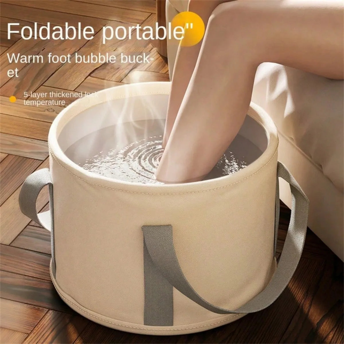 Foldable portable foot soak tub by S And B Enterprise in beige with grey handles; deep basin for warm foot spa.