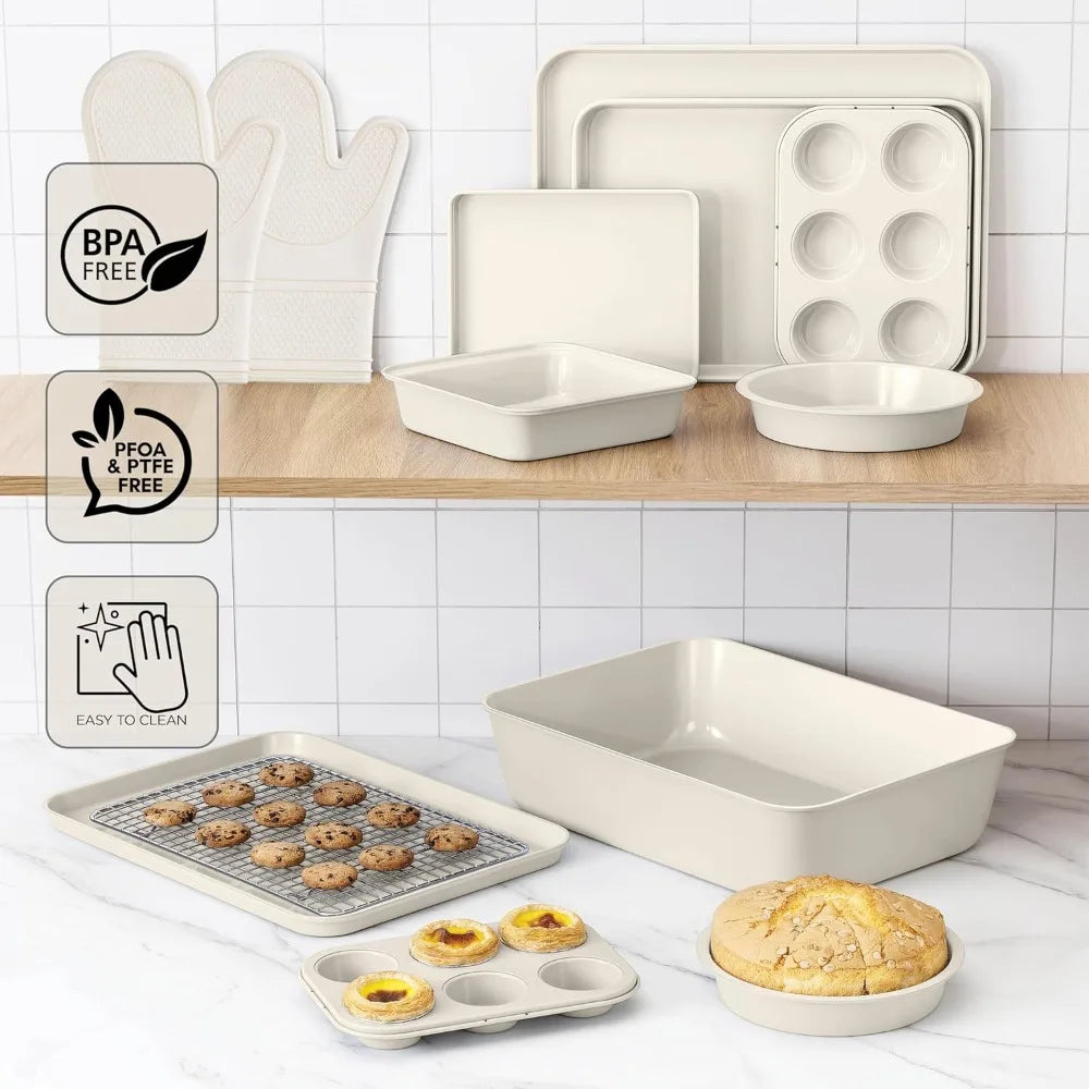 Cream 13-piece nonstick stackable bakeware set with heavy-duty pans including muffin tray and loaf pans
