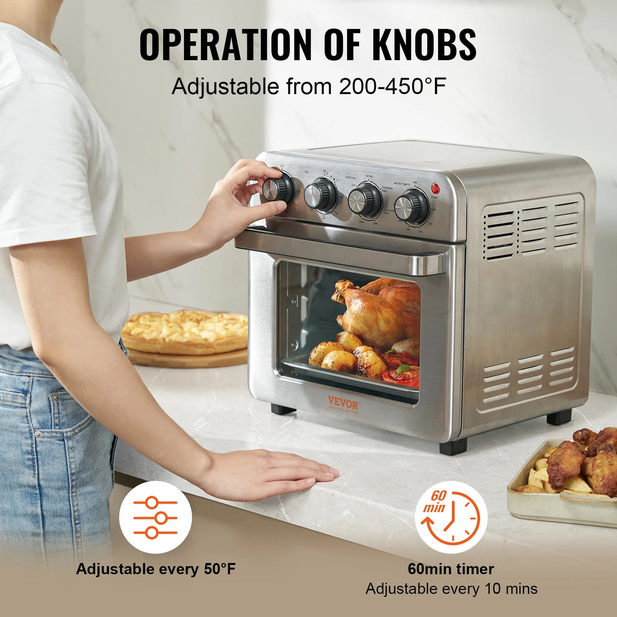 Air fryer toaster oven by VEVOR, stainless steel 18L 1700W on countertop with roasted chicken inside