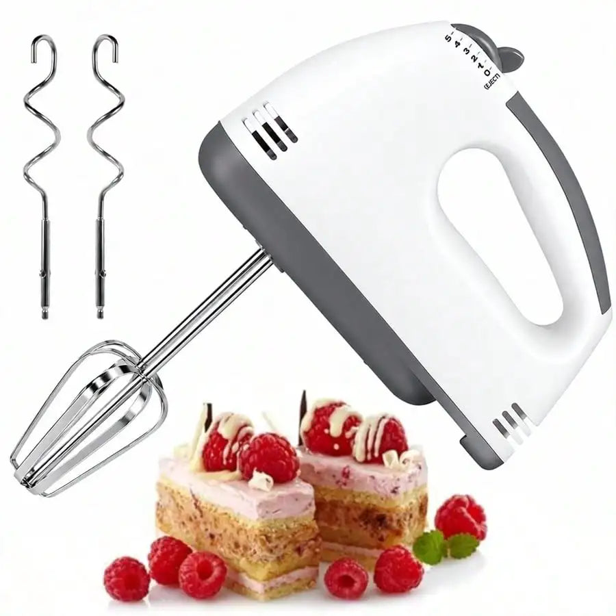 Handheld electric egg beater with 2 extra spiral beaters, white and gray, shown with raspberry cake slices.