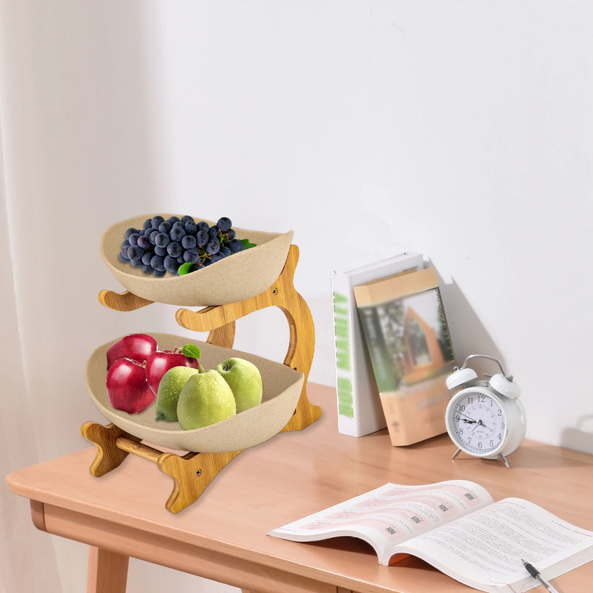 S And B Enterprise 2-tier fruit stand with wooden frame and beige bowls, filled with grapes, apples and pears.