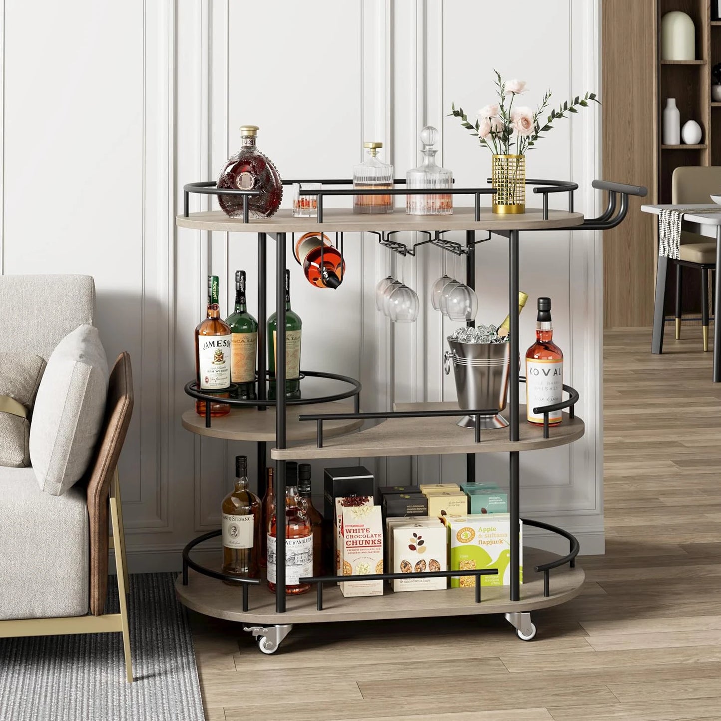 3-tier drinks trolley with wheels; wood shelves and black metal frame, wine rack and glass holders.