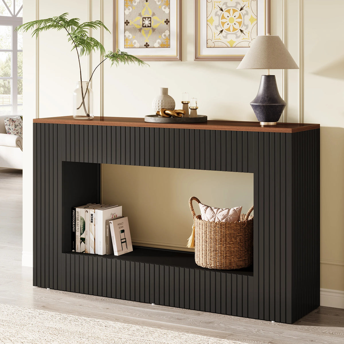 Tribesigns 55-inch wood console table with storage in black finish; open shelf with books, plus vase and lamp on top.