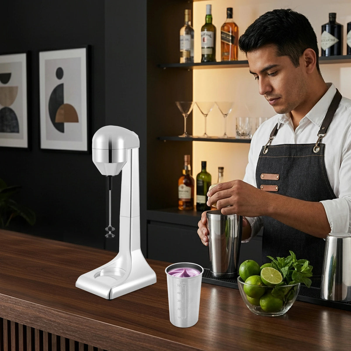 White stainless milkshake maker with 500ml measuring cup on a bar counter