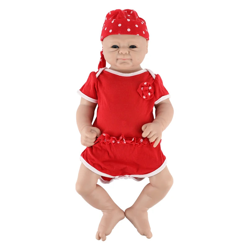 IVITA silicone reborn baby girl doll in red dress with white trim and polka-dot hat