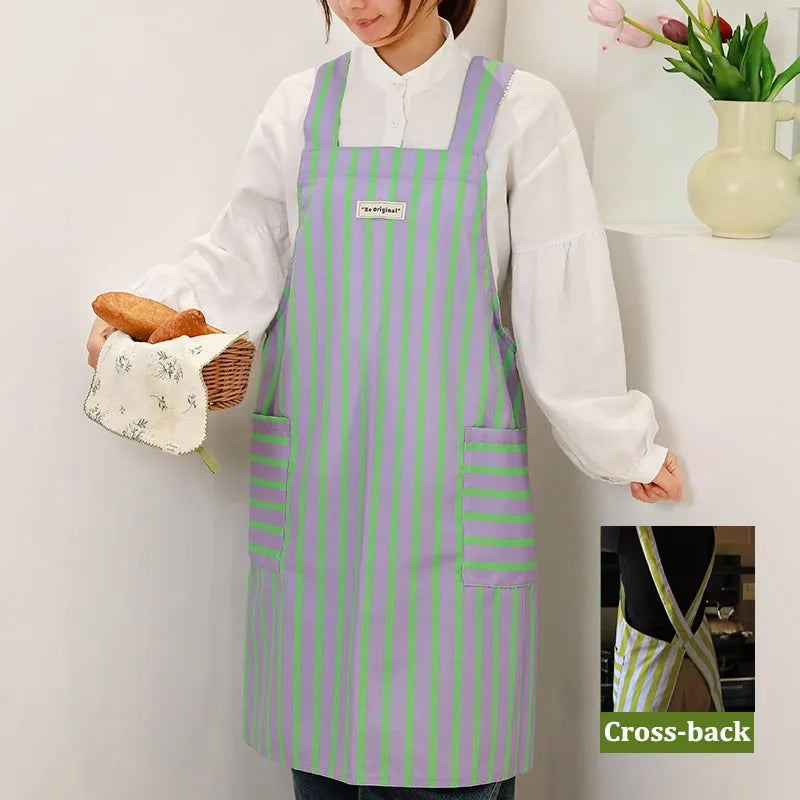 Women's cross-back striped apron in lavender and green with pockets, waterproof polyester-cotton, by S And B Enterprise.