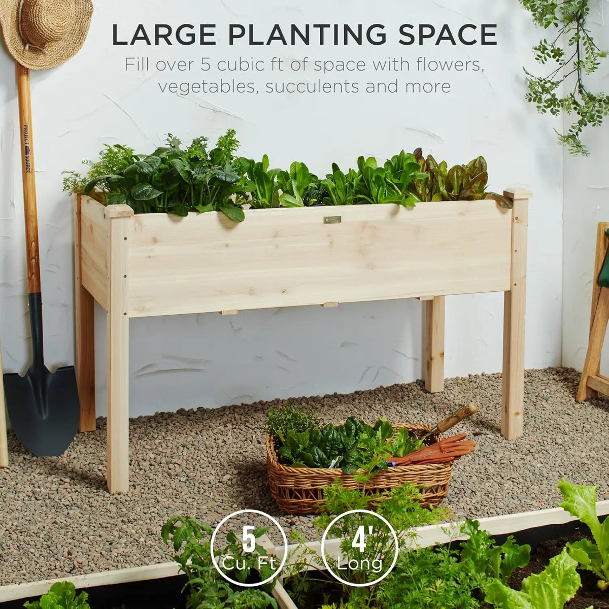 Elevated wooden planter box in natural wood finish, filled with leafy greens