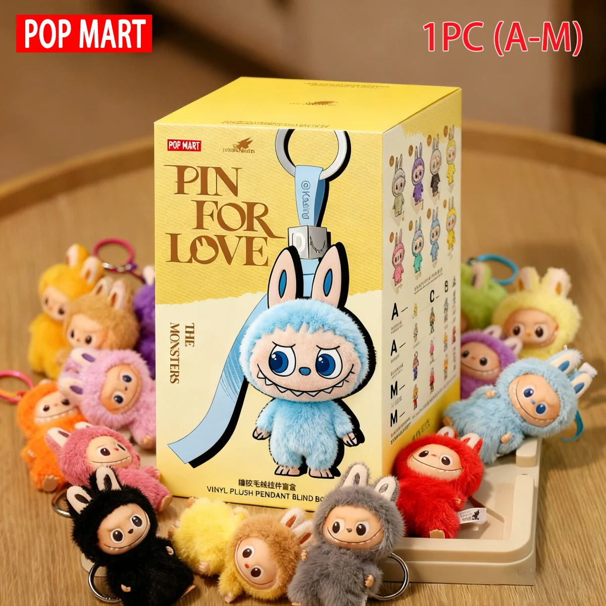 Labubu plush dolls by S And B Enterprise with yellow POP MART box and blue furry figure among plush keychains