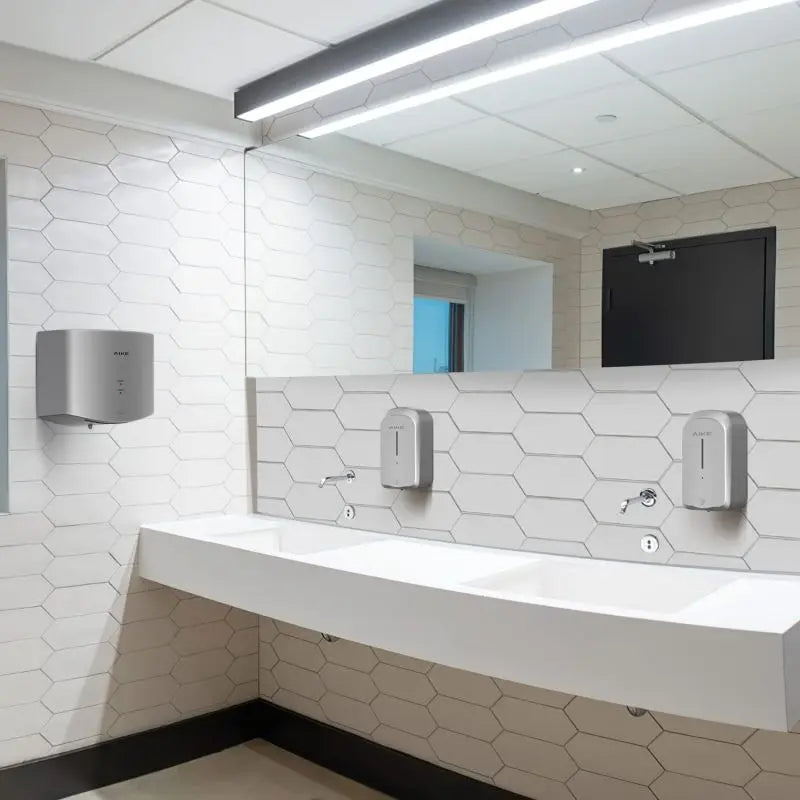 AIKE automatic sensor hand dryer 1400W, high-speed wall-mounted unit in a white tiled washroom