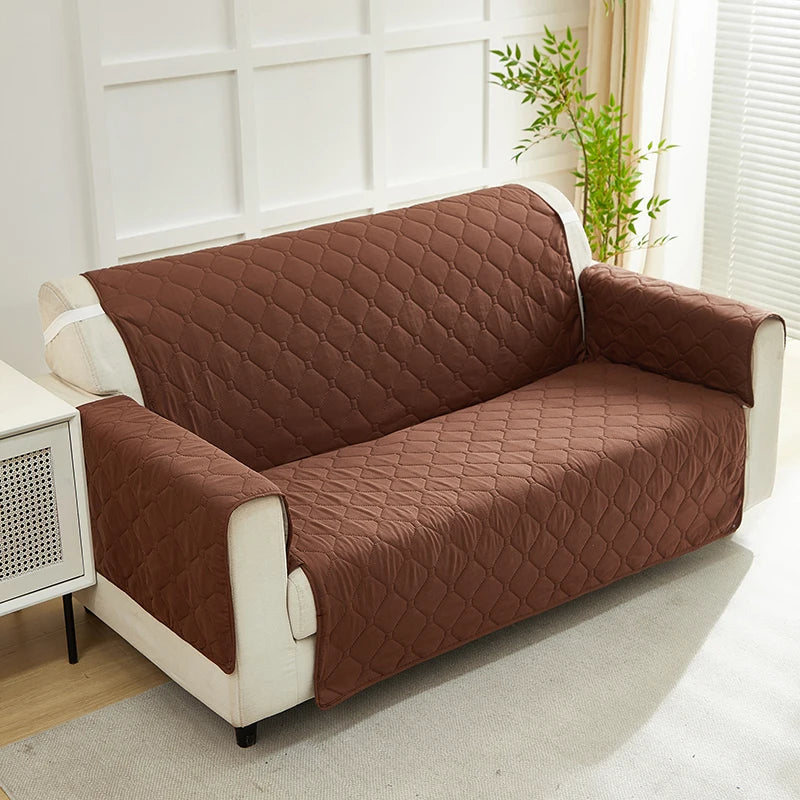 XM-Luvetoria integrated quilted sofa cover in brown fabric drapes over a beige couch, protective slipcover for 1/2/3 seater sofas
