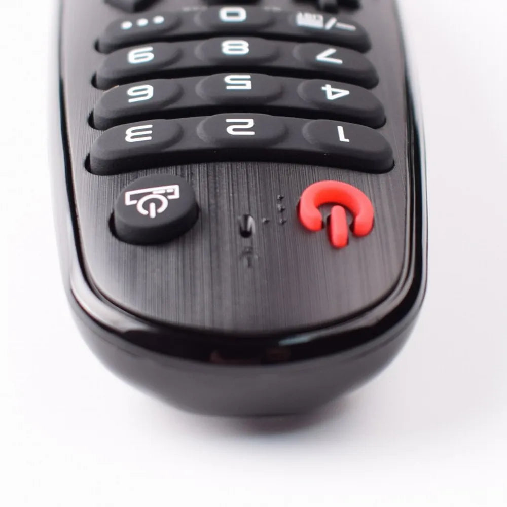 Smart TV remote control by S And B Enterprise, black with red circular cursor button and numeric keypad, LG compatible.