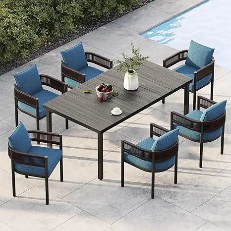 Outdoor Dining Set With Woven Metal Chairs And Cushions by S And B Enterprise