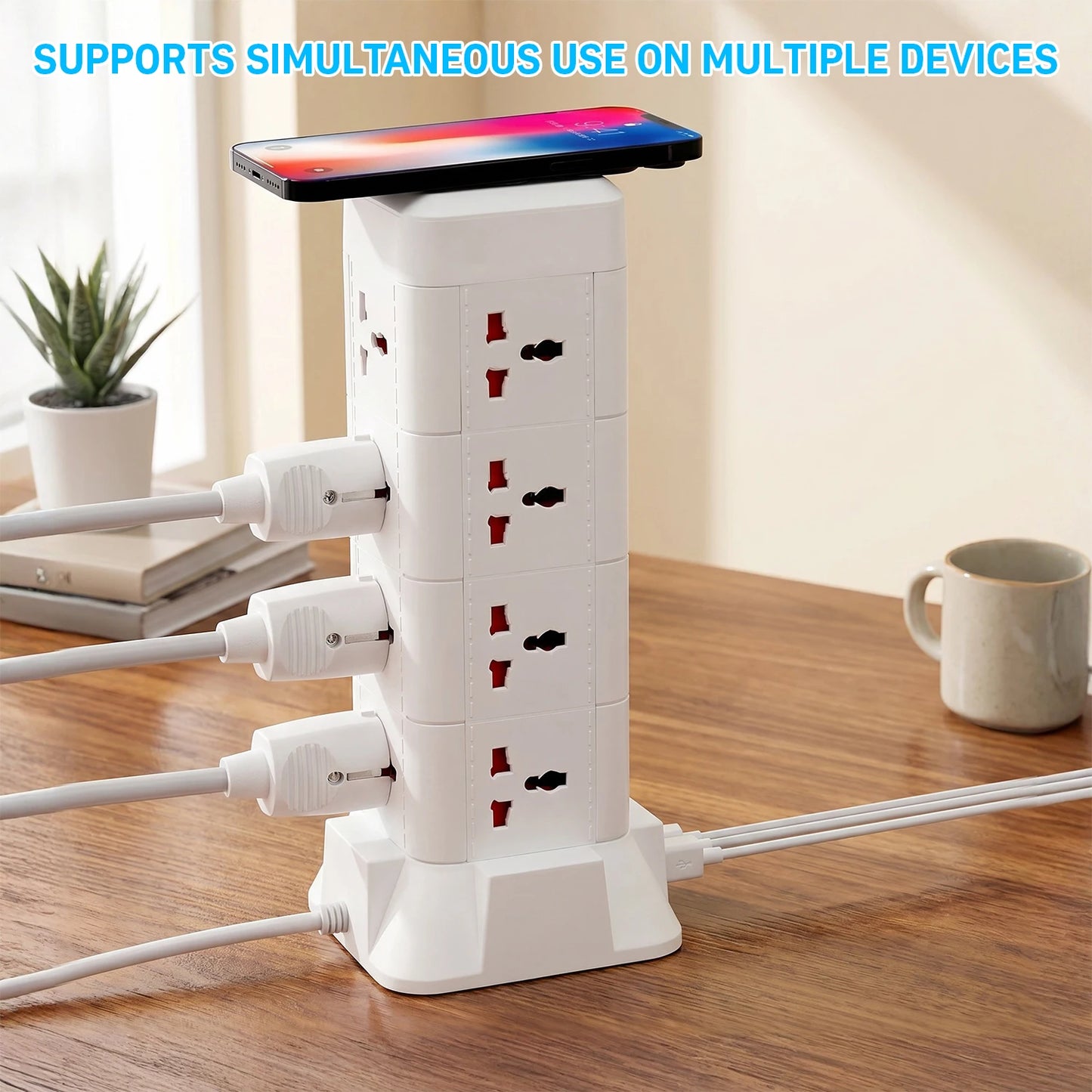 Power strip tower with 12 AC outlets and USB ports, white, smartphone resting on top