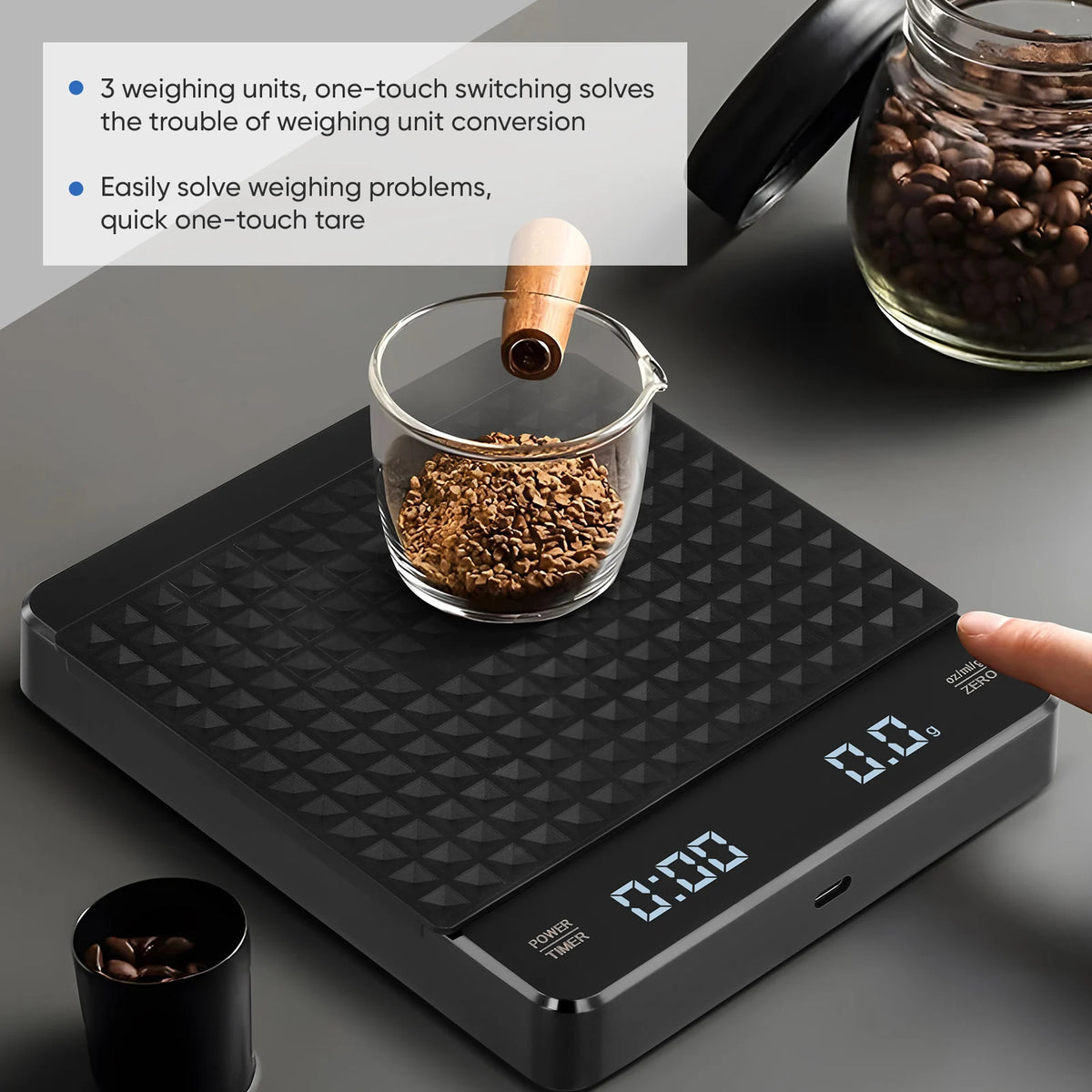 Black digital kitchen coffee scale with timer, 0.1g precision, 3 modes; glass bowl with coffee beans.