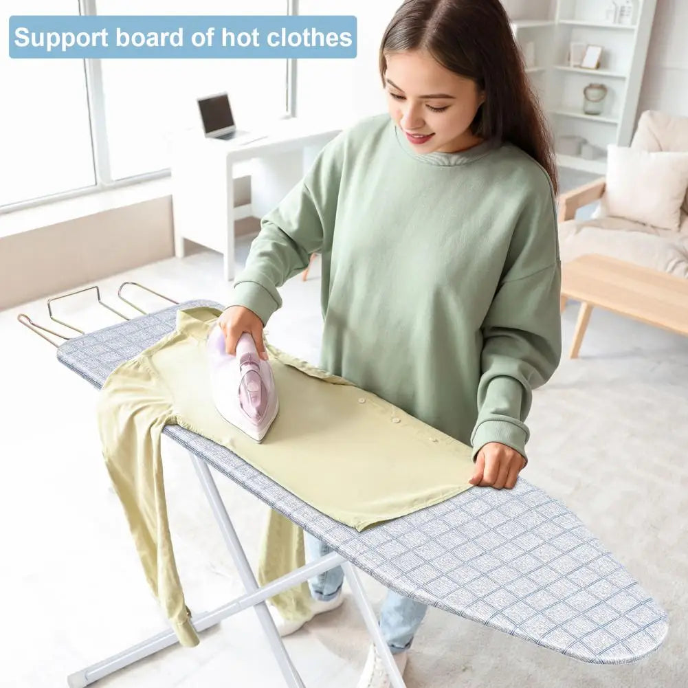 Foldable 42-inch ironing board with blue plaid heat-resistant cover, height adjustable, non-slip legs by S And B.