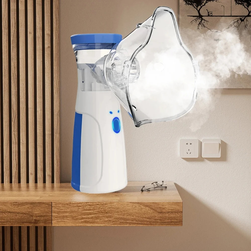 Revitalize 2-in-1 facial steamer and humidifier with water tank, white and blue, on a wooden desk