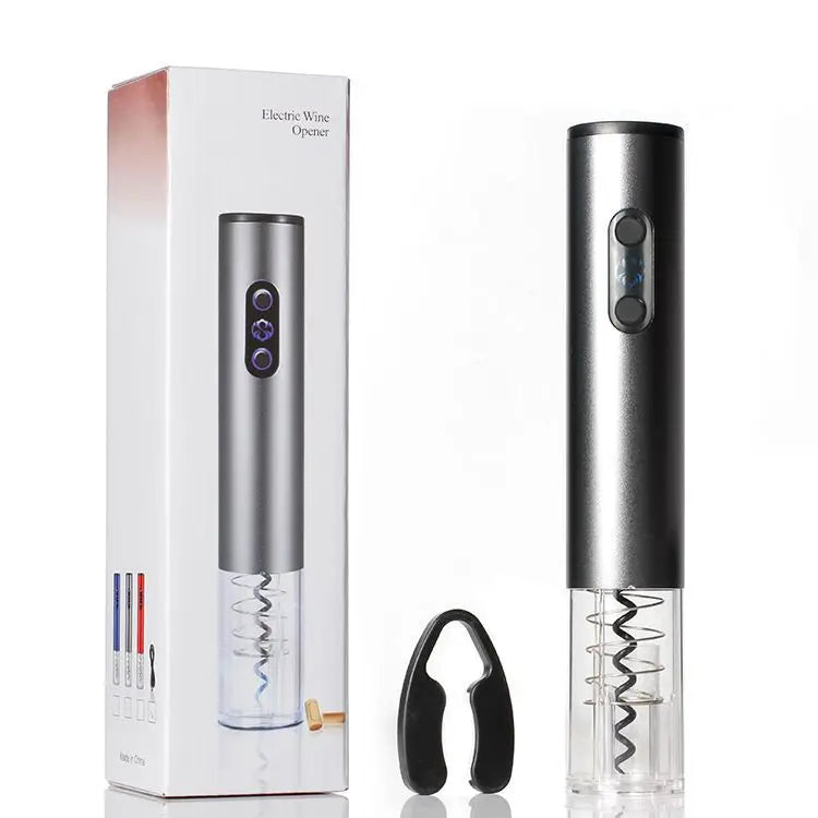 Electric wine opener with a silver cylindrical body and clear corkscrew chamber; includes a black foil cutter.