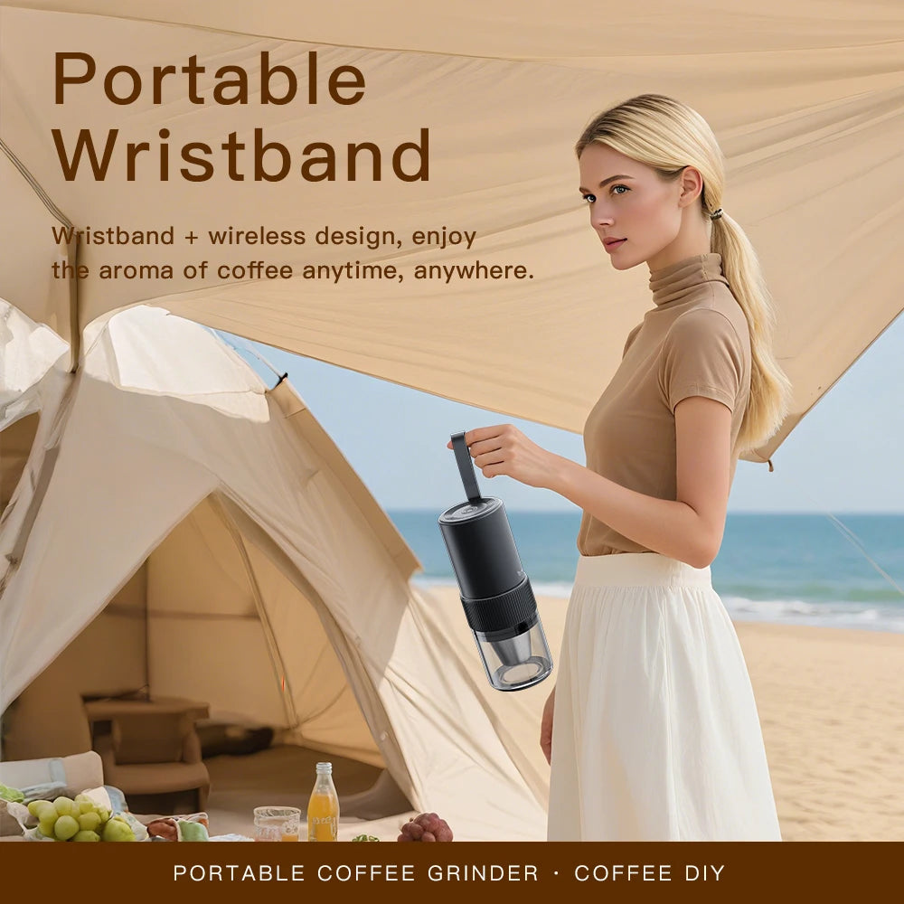 Portable electric coffee grinder by S And B Enterprise; black handheld grinder with a clear jar for outdoor use