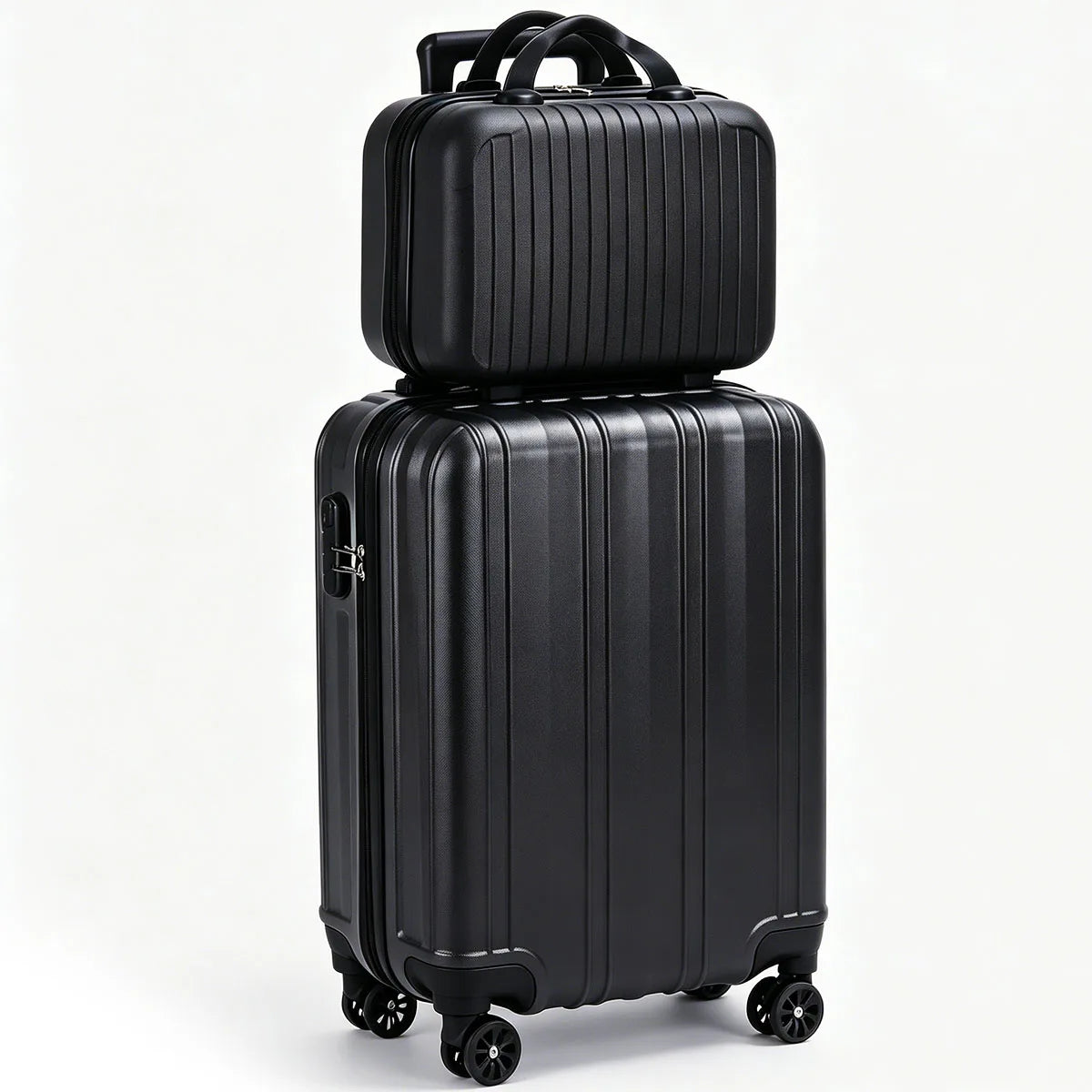 2-piece hardside black luggage set with stacked carry-on on a large spinner suitcase