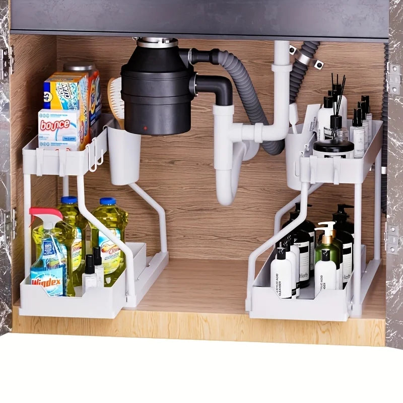 Space Saving 2 Tier Under Sink Organizer by S And B Enterprise; two white pull-out storage units for bottles.