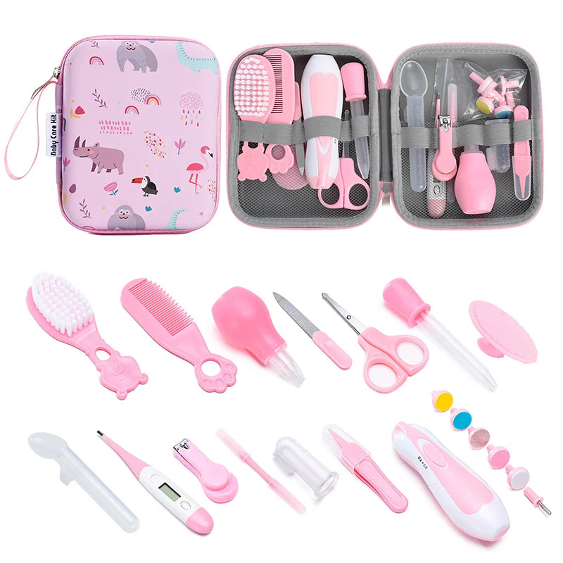 Pink 20-piece baby healthcare and grooming kit in a zip case with brush, comb, nail trimmer, nasal aspirator and scissors
