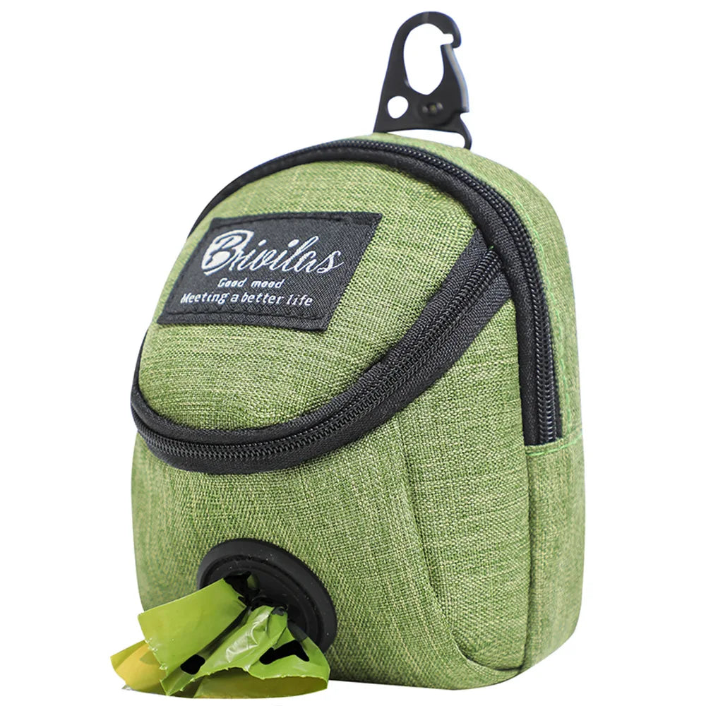 Portable green dog treat bag with zippered main compartment and waste-bag dispenser, waist-bag style